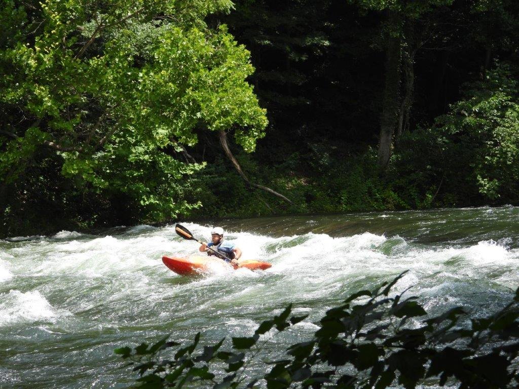 Red kayak in Bee Cliff whitewater
